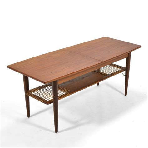 Low price guarantee and expert service for connubia. Danish Teak Extension Coffee Table For Sale at 1stDibs