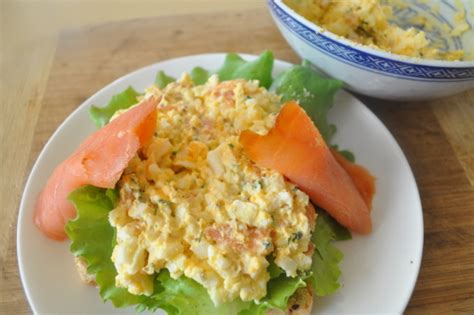 The smoked salmon is combined with basil, cream cheese, and mayonnaise, then the mixture fills flaky little croissants, accented with whole basil leaves. Egg Salad And Smoked Salmon Sandwiches Recipe - Genius Kitchen