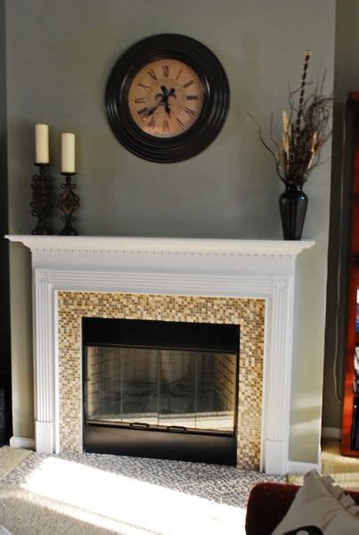 I just tiled over the brick, added a new. Fireplace Update w/ Mosaic Tiles. Good call getting rid of ...