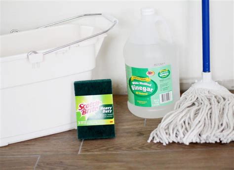 For tougher stains, such as mildew, make a paste out of baking soda and hydrogen peroxide, apply it to the grout, and scrub. Removing Grout Haze the Easy Way - Chris Loves Julia