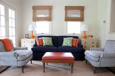 This home office area features several turquoise accents. love the navy and orange combo! | Turquoise living room ...