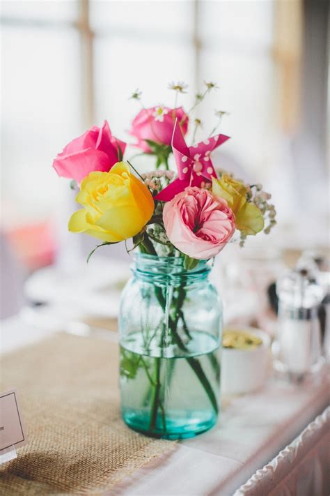 Mason Jar Center Pieces Paired With Twine Wrapped Wine Bottle Mason