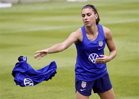 uswnt forward alex morgan 13 takes her warmups off during a training session in preparation for