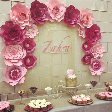 Our premier backdrop pipes and drapes also work as a sophisticated adornment piece for casual or professional use. Pink paper flower backdrop, baby shower | Paper flower ...