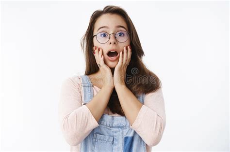 Waist Up Shot Of Surprised And Amazed Young Cute Female Geek In Glasses Dropping Jaw Saying Wow