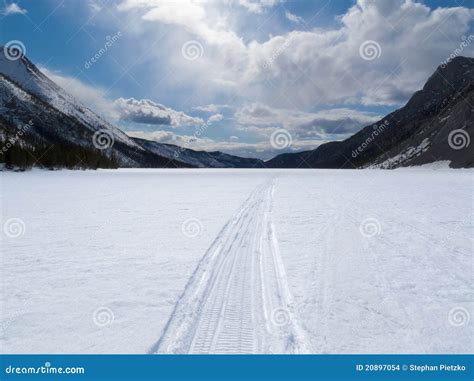 Well Used Winter Trail On Frozen Mountain Lake Stock Photo Image Of