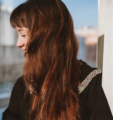 Portrait Of Young Woman With Shiny Ginger Hair Del Colaborador De Stocksy Amor Burakova