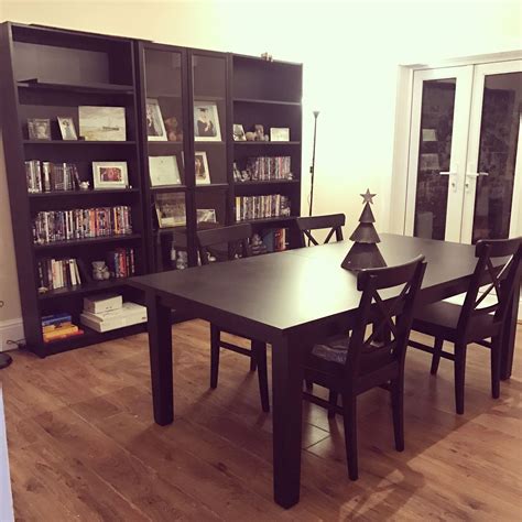Extendable dining table makes it possible to adjust the table size, it's also time to extend your dinner time. Ikea dining table and bookshelf with wooden floor. Black ...