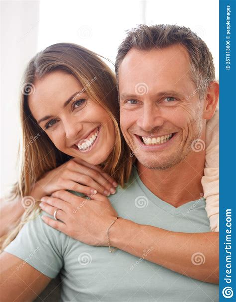 The Perfect Couple Portrait Of A Happy And Affectionate Couple Smiling