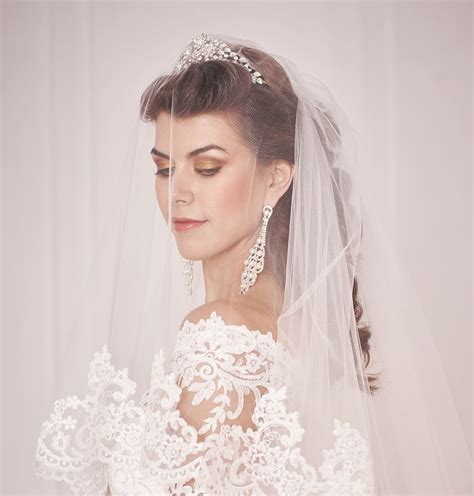 20 Swoon Worthy Wedding Hairstyles With Tiara And Veil