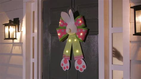 Hanging Lighted Door Bows From Evergreen Youtube
