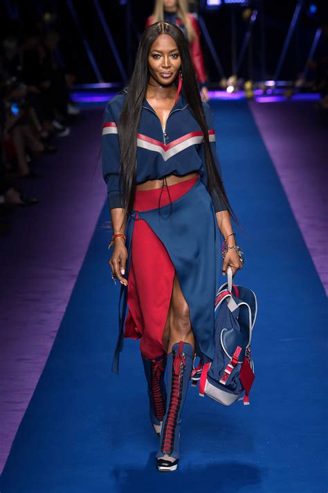 She has chestnut hair and brown eyes, but she wears colored contact lenses, blue and green. Naomi Campbell leads bold Versace runway in Milan - News ...