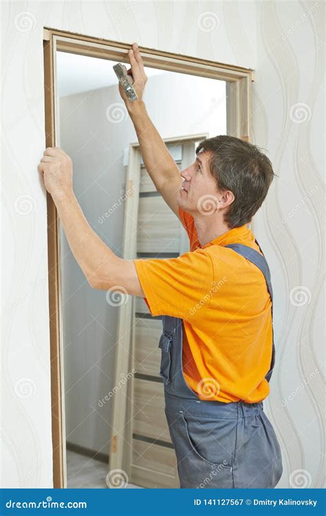 Door Frame Installation Carpenter Works With Drill Stock Image Image