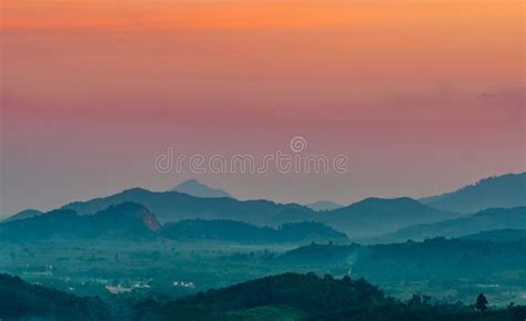 Beautiful Nature Landscape Of Mountain Range With Sunset Sky And Clouds