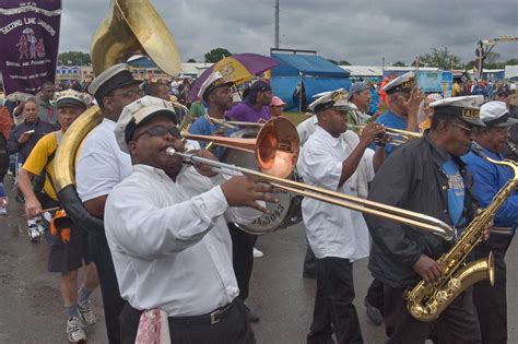 New Orleans Marching Band Algiers Brass Band Marching During Jazzfest