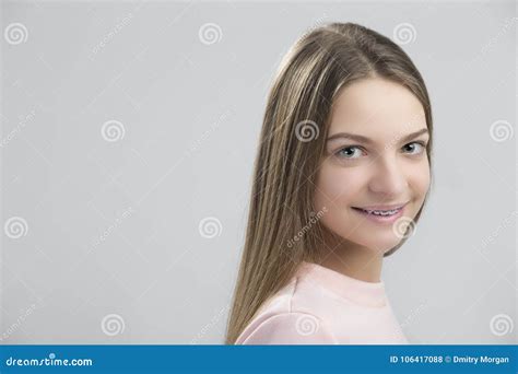 Dental Concepts Portrait Of Happy Teenage Female With Teeth Braces