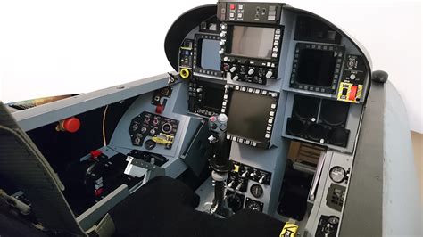 The pilot's center control stick is relatively typical of a modern fighter aircraft. Bergisons F/A-18 Super Hornet flight simulator