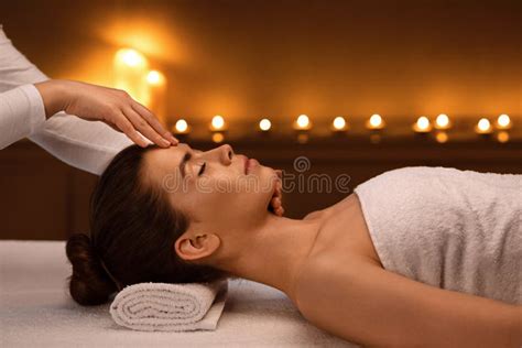 Spa Therapist Making Relaxing Head Massage For Young Beautiful Lady Stock Image Image Of