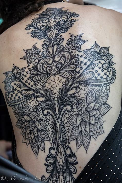 A simple but meaningful design. 15 Large Back Tattoos for You - Pretty Designs