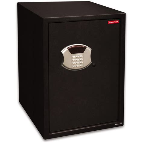 Solid steel construction with 2 number combination lock, a coin slot on top and a ringing alarm that sounds when you open the door. Honeywell 5107 Safe Large Steel Security Safe / 2.66 cu ...