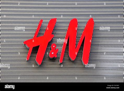 Sign With Handm Logo Of Clothes Shop Stock Photo Alamy