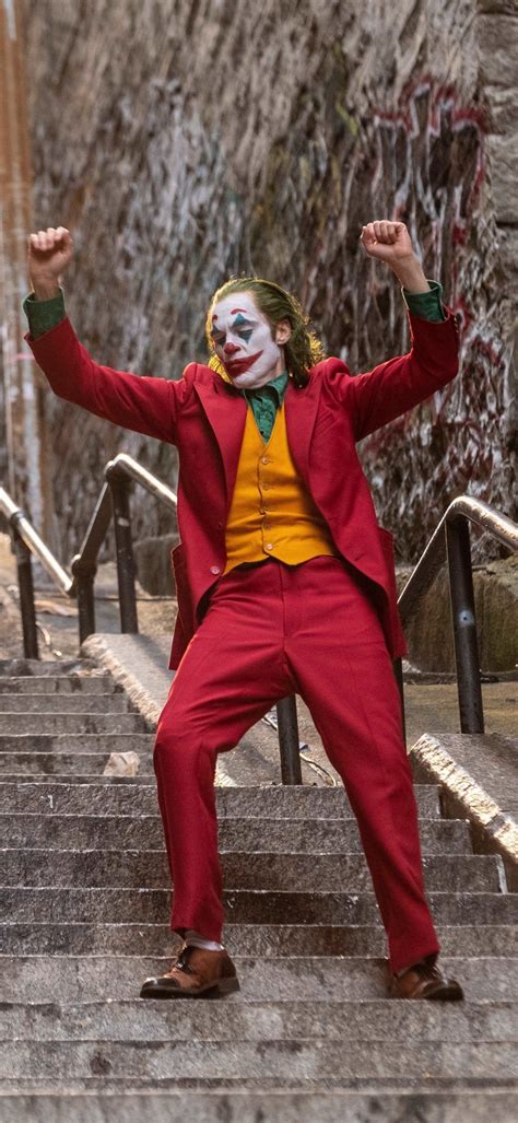 1080x2340 Joaquin Phoenix As Joker Dancing 1080x2340 Resolution