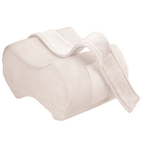 Hourglass design promotes proper parallel alignment of the legs, hips, and spine. MEMORY FOAM KNEE SPACER WITH STRAP