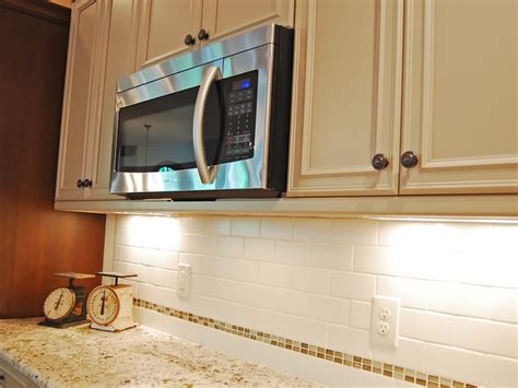 How much does it cost to install under cabinet lighting? Light Rail Under Microwave - Traditional - Kitchen ...