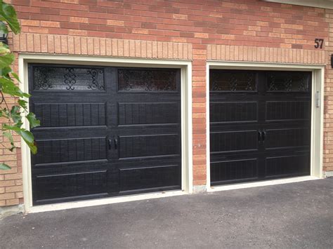 8x7 Clopay Steel Insulated Long Panel Carriage Doors In Black With