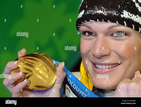 Maria Riesch Of Germany Celebrates Winning The Gold Medal During The