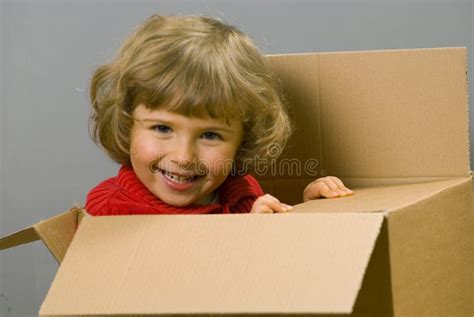 Angry Teenage Girl Sitting In A Cardboard Box Stock Image Image Of
