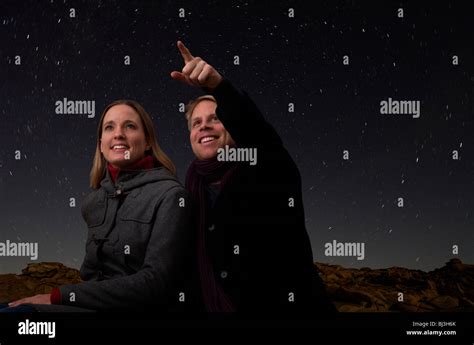 Couple Watching Starry Night Sky Hi Res Stock Photography And Images