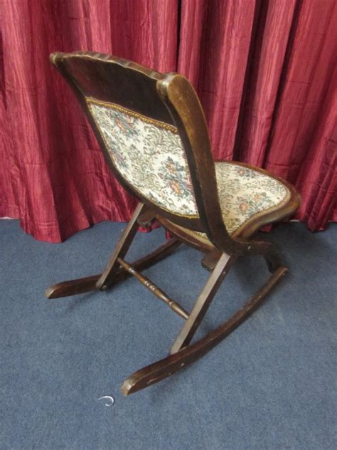 The cane seat has no tears or rips. Lot Detail - UNIQUE ROCKER! VINTAGE FOLDING WOODEN ROCKING ...