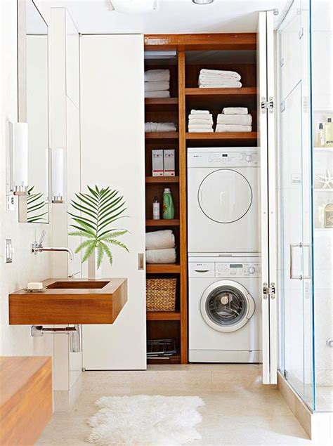 Interior design with white cabinets and light. Modern Laundry Room Inspiration | HomeDesignBoard