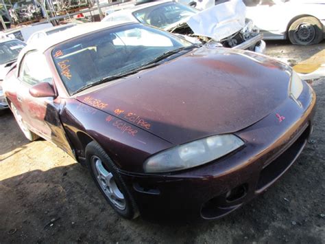 The convertible top works flawlessly, and the vehicle is surprisingly quite with the top up. 1999 MITSUBISHI ECLIPSE SPYDER GS PURPLE 2.4L AT 163807 ...