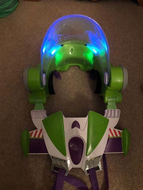 Childs Wearable Buzz Lightyear Helmet Jet Pack And Hand Launcher In