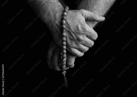 Male Hands Holding A Church Rosary Church Rosaries In The Hands Of Men