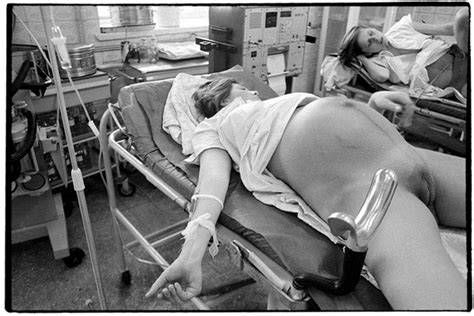 Pregnant female feeling the pain of contraction labor in hospita. Maternity hospital (1988) - Roman Pyatkovka Photography ...