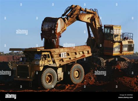 Excavator Loading Mine Dump Truck Stock Photo Alamy