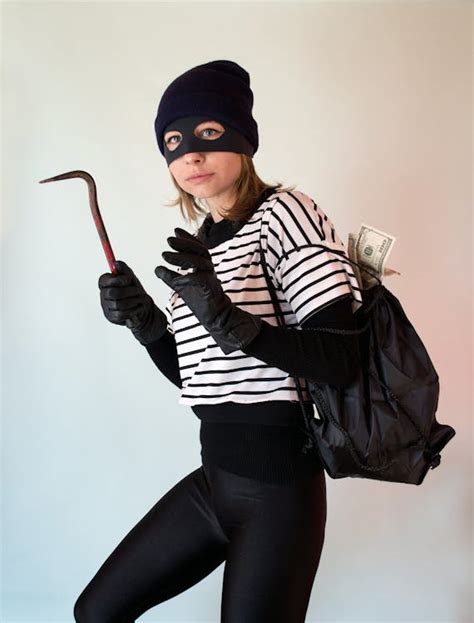 A Woman Wearing Robber Costume · Free Stock Photo