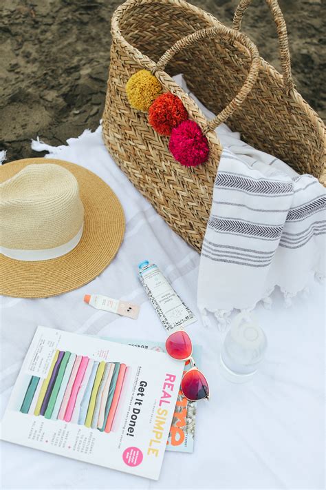 beach bag essentials what to pack for a day at the beach pretty and fun