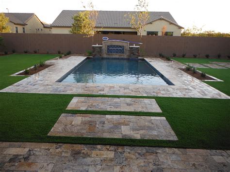 Synthetic Grass Surrounding Your Pool Makes A Gorgeous Appearance