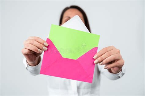 Female Professional Holding Envelope And Letter In Hands With Important
