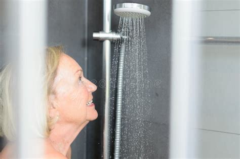 Smiling Attractive Senior Woman Taking A Shower Stock Photo Image Of