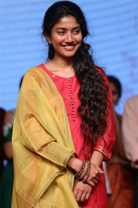 Long hair braided angel standing before a bus. Beautiful Indian Girl Sai Pallavi Long Hair in 2020 ...