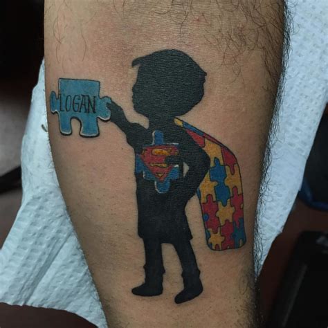 His right shoulder is covered with the portrait of the tiger in a very calm posture. Tag your #superman . . Tattoo by @andrestattoos #autism #a ...