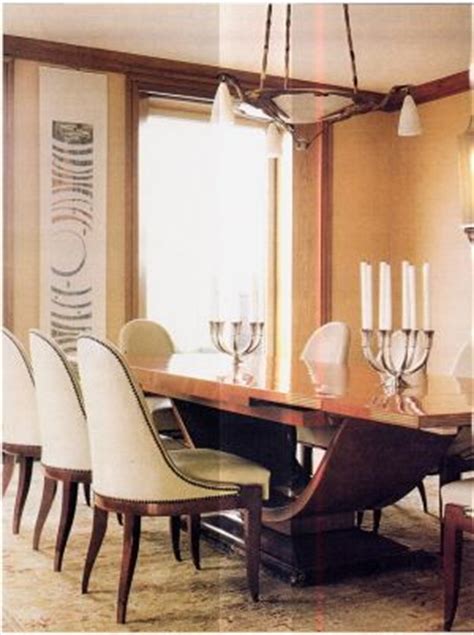The velvet club chair features a lush dense padded seat. Remodelaholic | Art Deco Dining Room