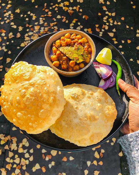 Chole bhature is a combination of chickpea curry now remove the cling sheet and press the dough in the center to remove all the excess air and knead again. Bhatura (Puffed Deep fried Indian Bread) : Spice Trip with ...