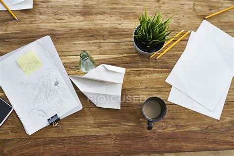 Papers On Wooden Table In Office — Indoors Cup Stock Photo 265354312