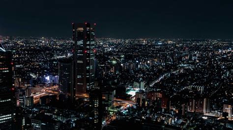 Download Wallpaper 1366x768 Night City Aerial View City Lights